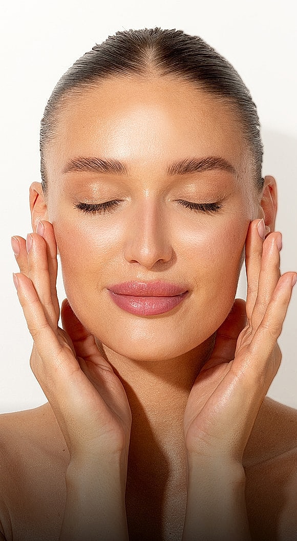Close-up of a thoughtful woman in black sweater.