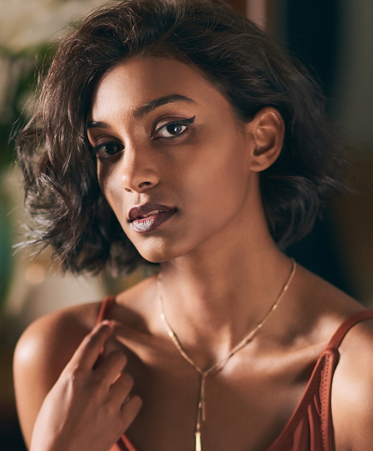 Portrait of a woman with short, wavy hair.