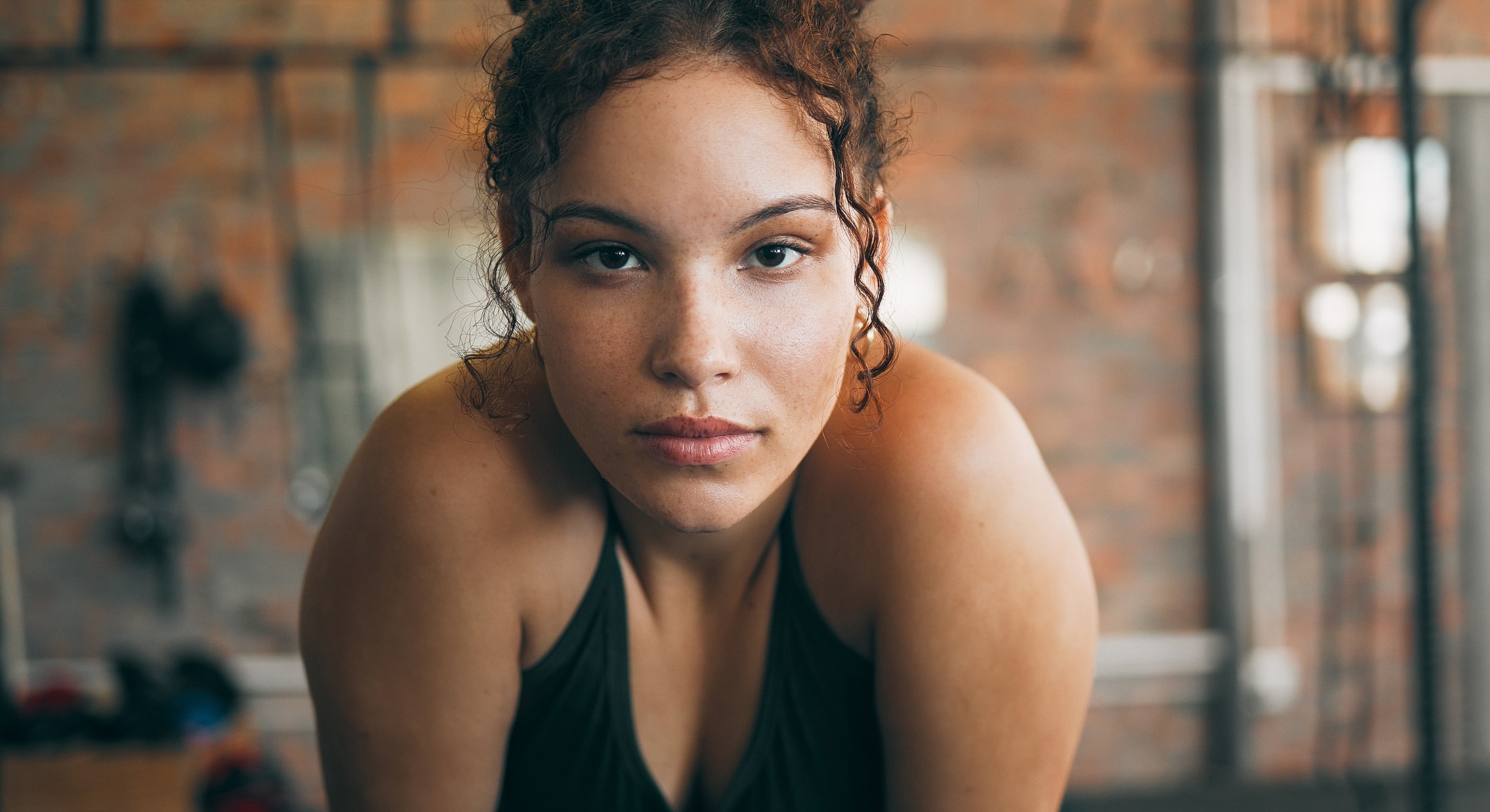 Focused athlete in a gym setting.